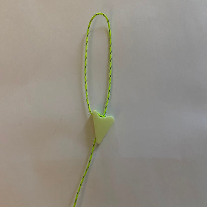 bright green guyline chord with a tensioner showing the end loop of chord on a white background
