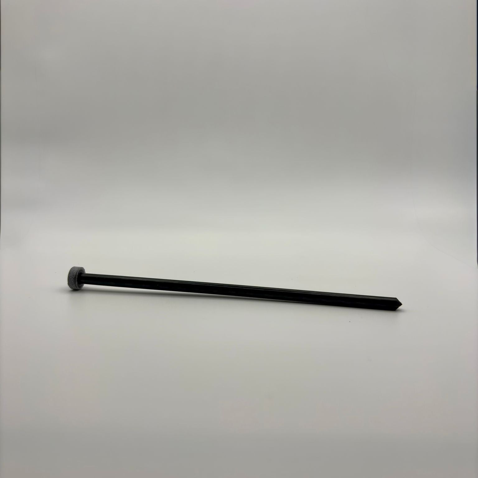 ULpeg 15cm 3.2grams carbon fibre tent peg on a white background